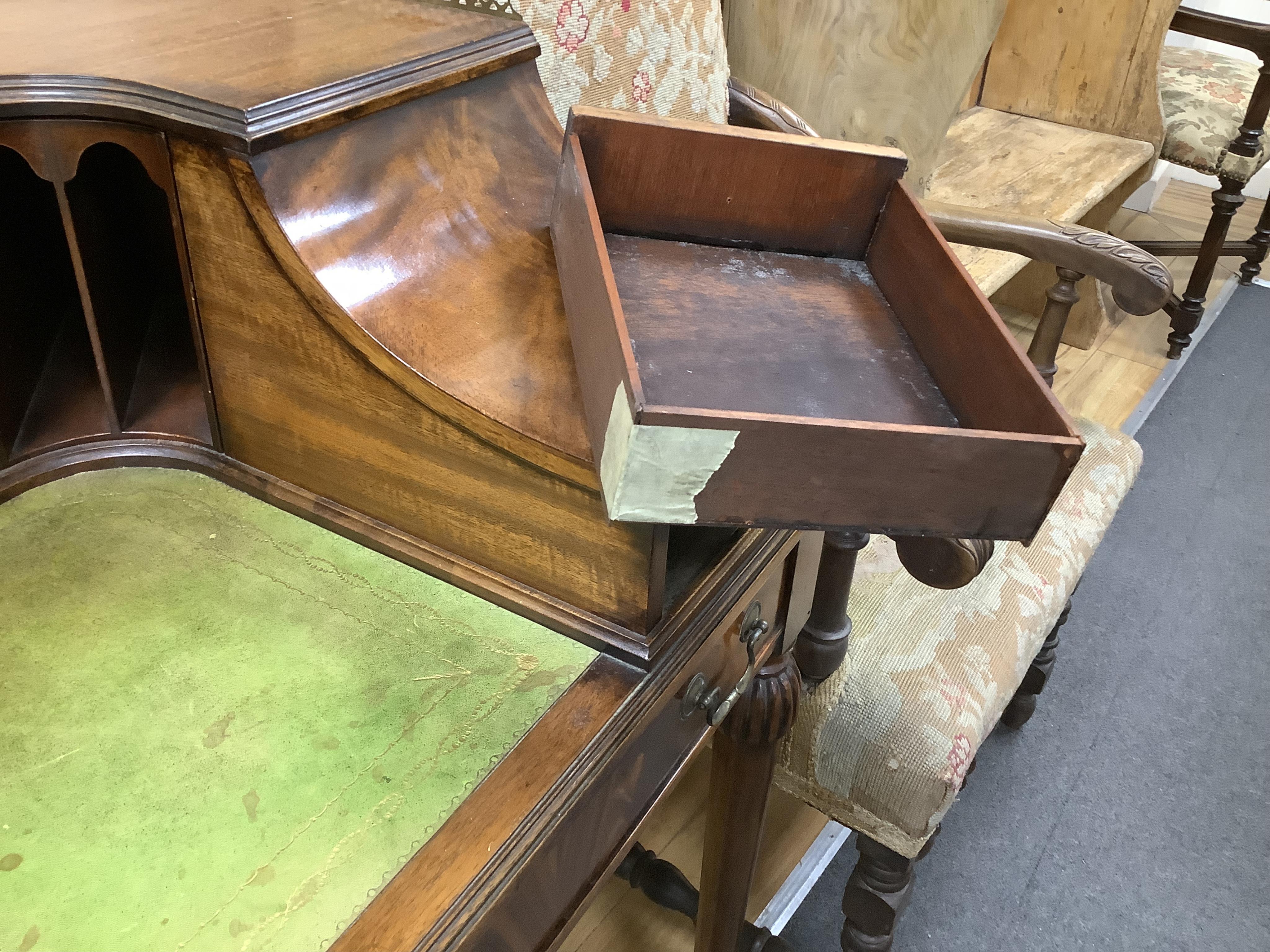 A reproduction mahogany Carlton House style desk, width 122cm, depth 62cm, height 98cm. Condition - fair to good